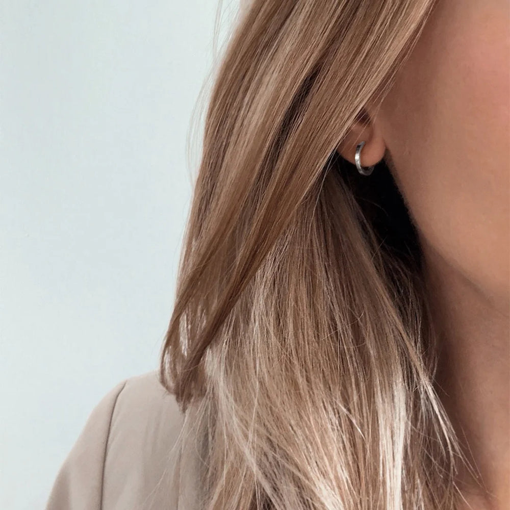 huggie hoop earrings made in waterproof stainless steel from icône 