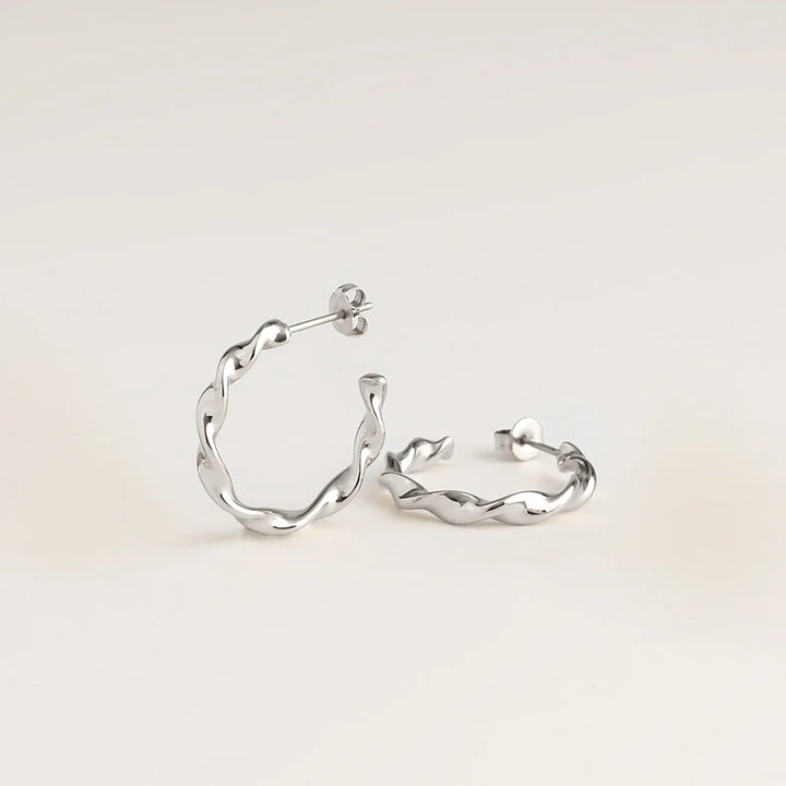 twisted hoop earrings silver made in waterproof stainless steel from icône