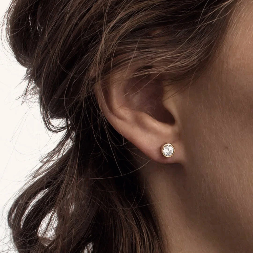 minimalist little star stud earrings made in gold plated silver from Icône