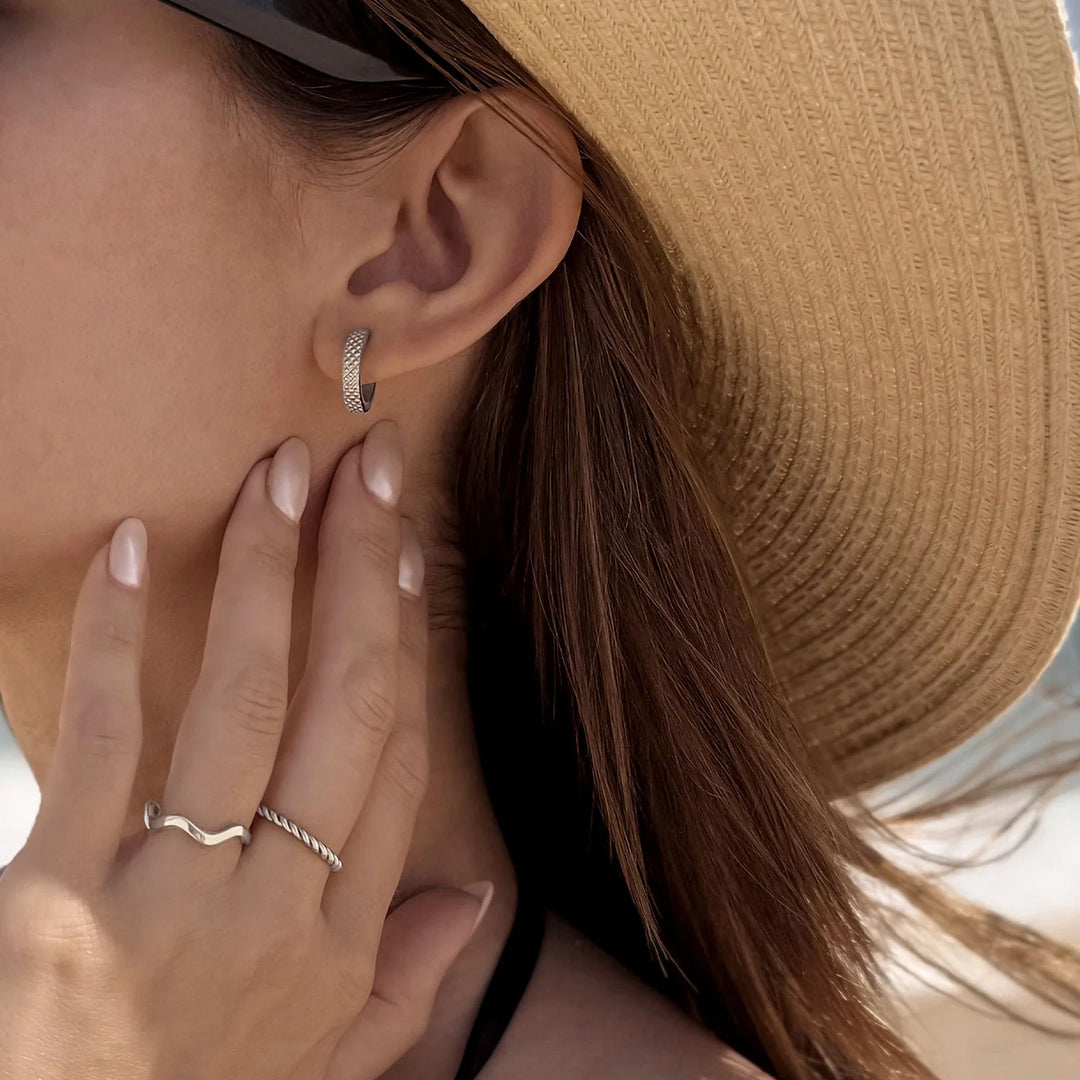 wavy ring and twisted ring and earrings made in waterproof stainless steel from icône 